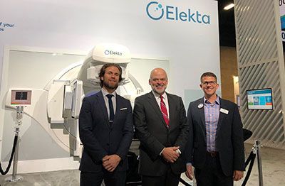 Aaron Oaks and Bob Thomas from Elekta with Steve Hardy, Executive Vice President of Development and Corporate Relations