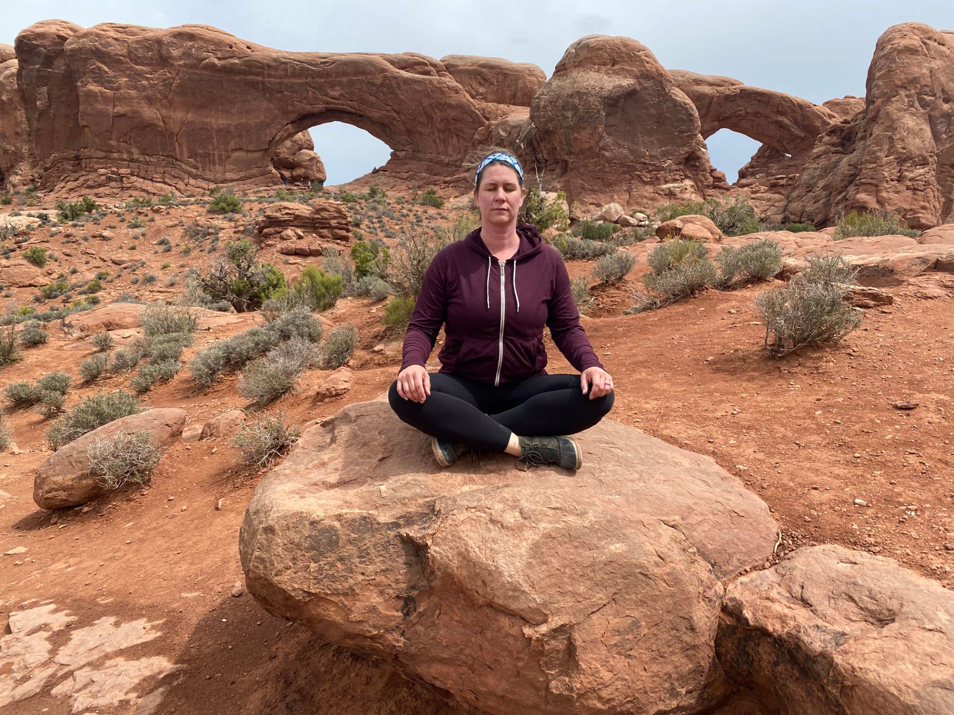 Ellen Cooke Sat Meditating on a Rock