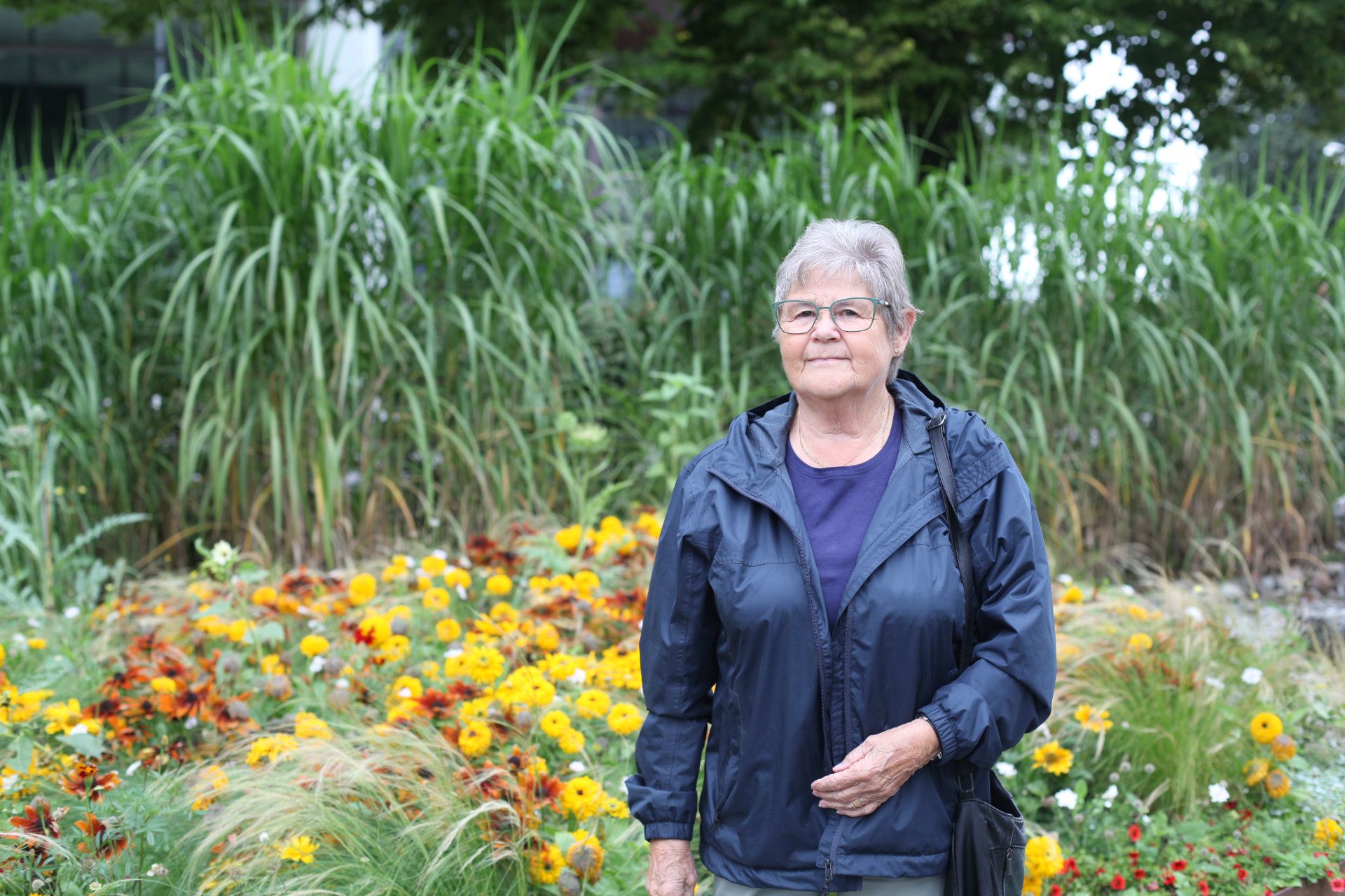 Maggie Larsson Stood in Flower Garden