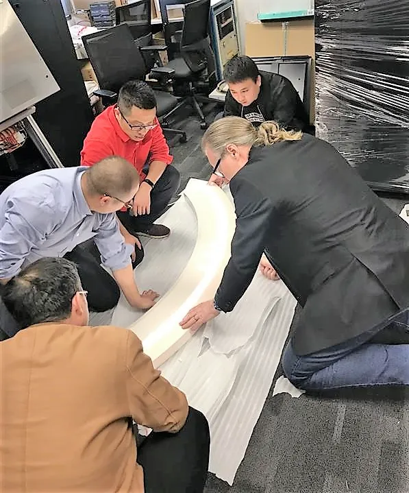 Kjell and the Team Evaluating a Light Belt Mockup for Harmony