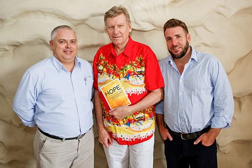 From left to right: Elekta’s Justin Turpin and Genesis CancerCare Queensland’s David Schlect and Damian Mason