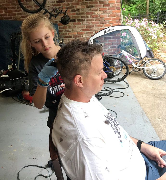 Alex’s middle daughter shaving his head