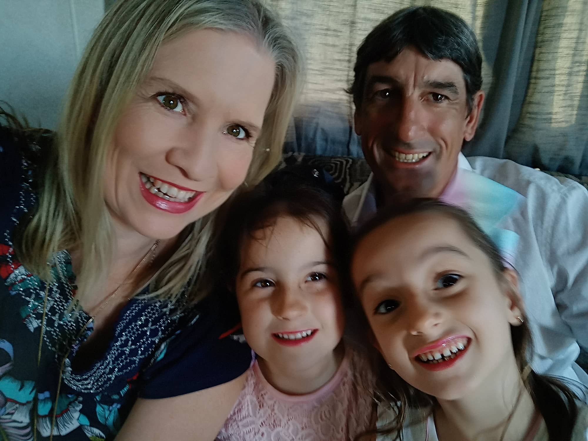 Debbie with her husband and two daughter
