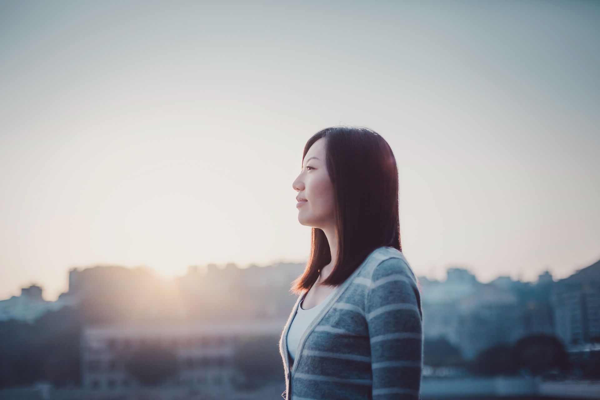 Woman Looking Over Urban Horison