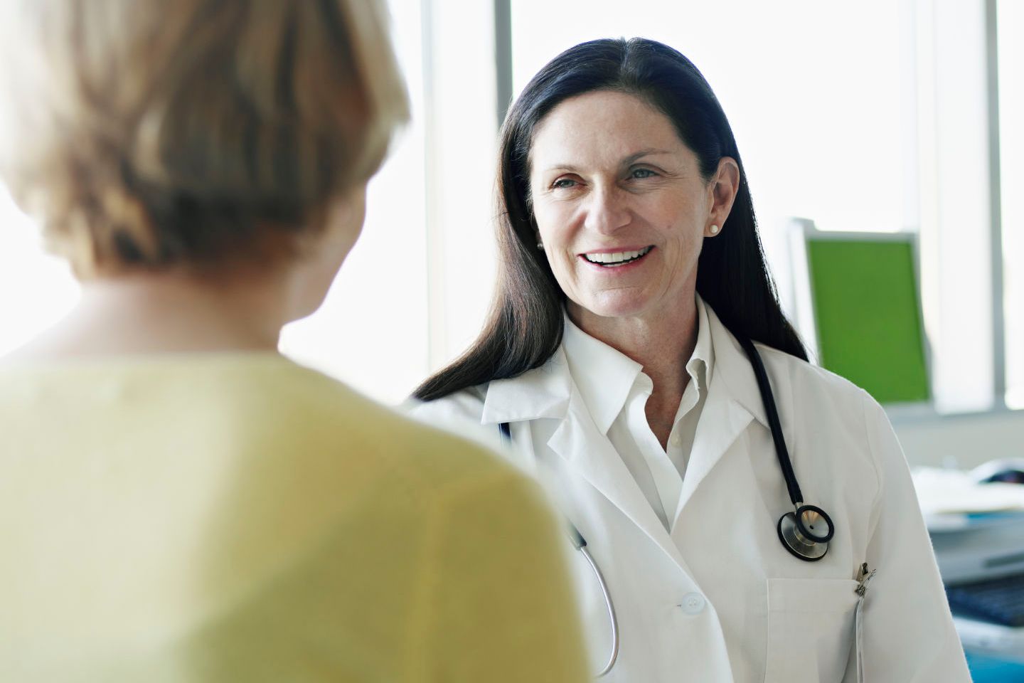 Doctor Speaking to Patient