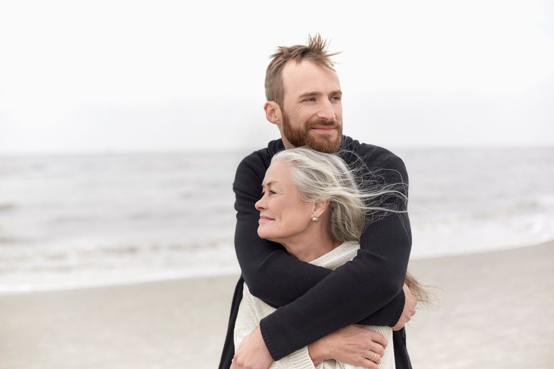 Mother and Son Hugging at the Beach